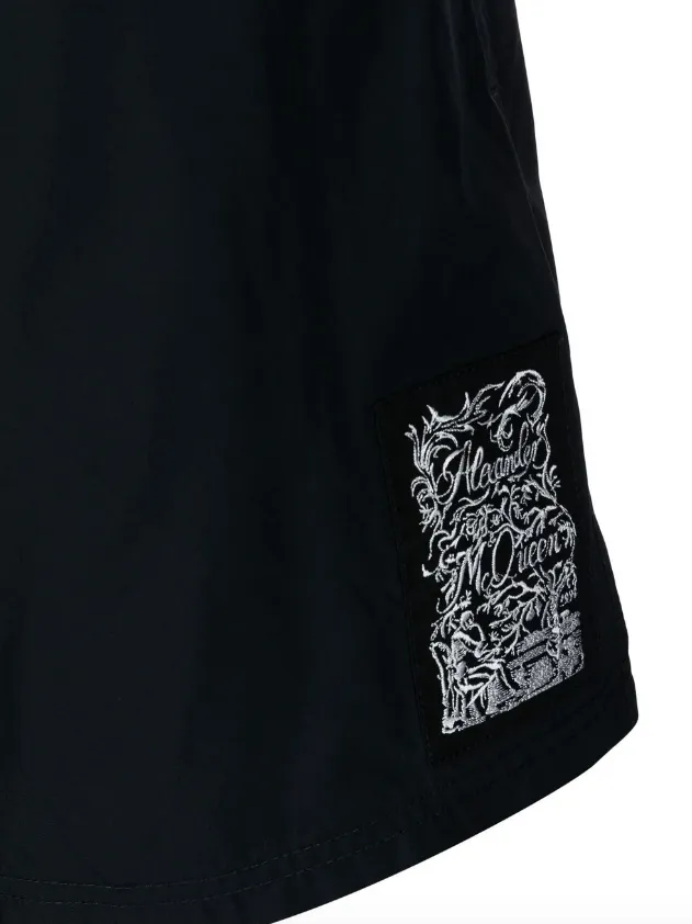 Alexander McQueen embroidered-logo swim shorts