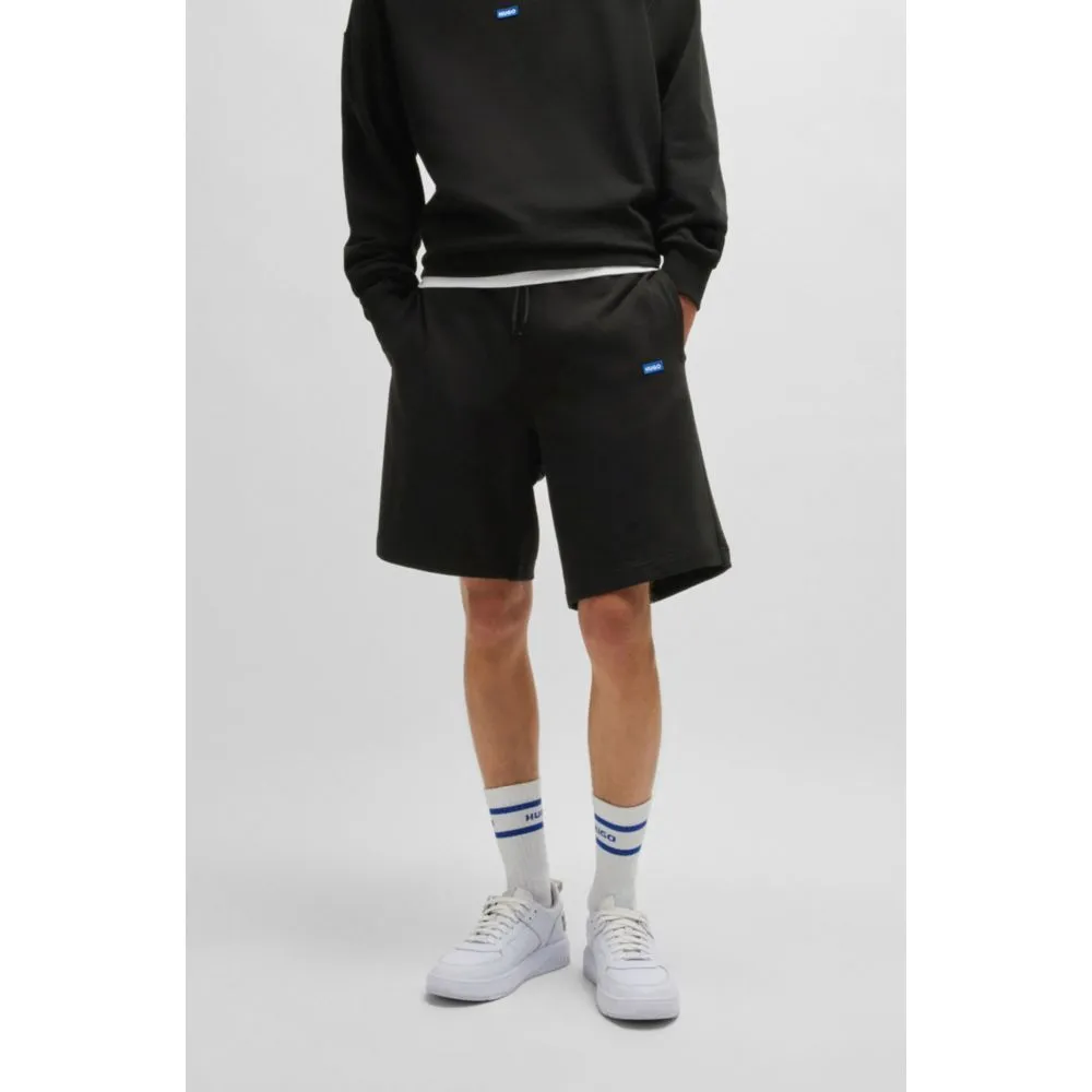 Cotton-terry shorts with blue logo patch