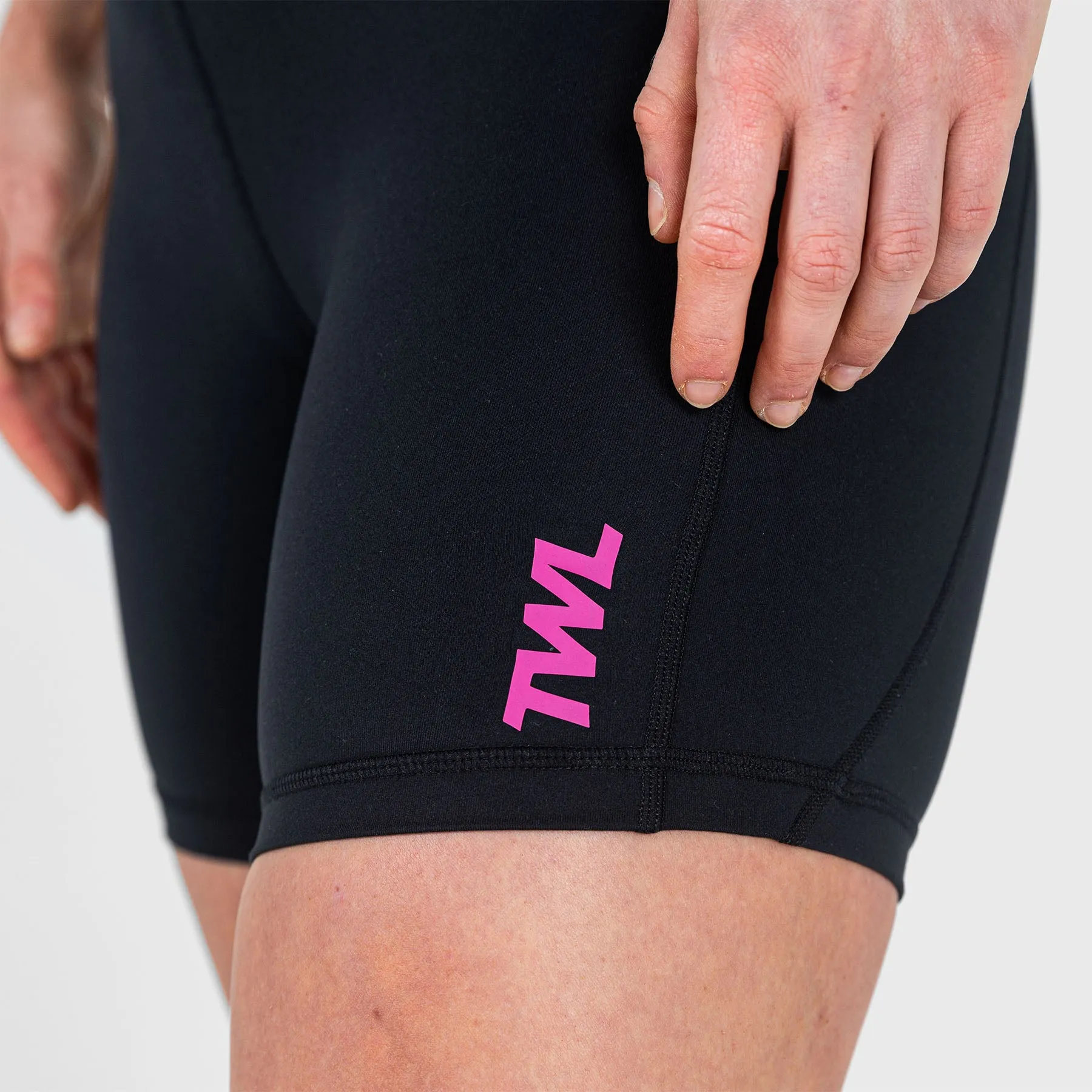 TWL - WOMEN'S ENERGY SHORTS MID LENGTH - BLACK/RASPBERRY